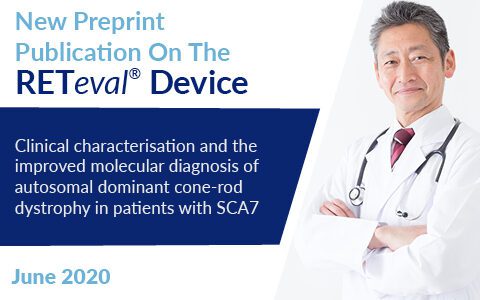 Male Asian doctor in white lab coat smiling